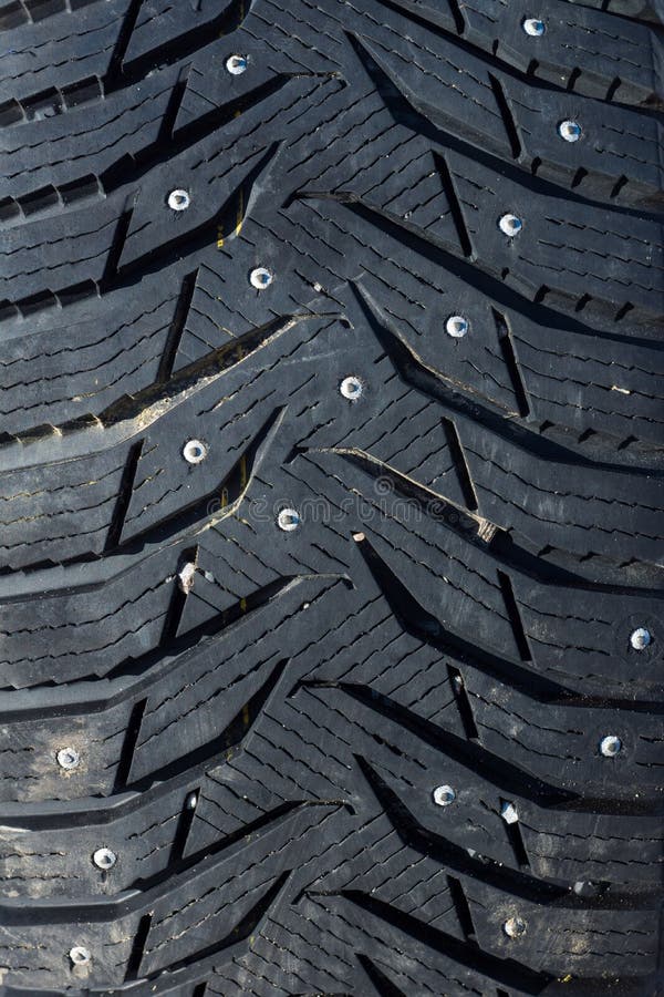 Texture, car tire with studs. royalty free stock images
