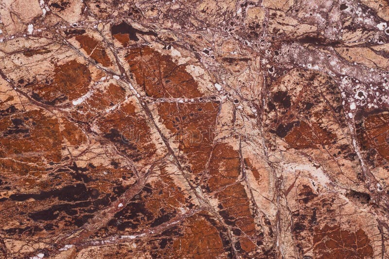 Texture of colored stone. Brown marble background. Grunge rock wall. Abstract natural pattern for design. stock photo