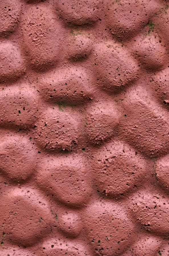 The Texture of the Concrete Wall is Made To Look Like Stone and Painted