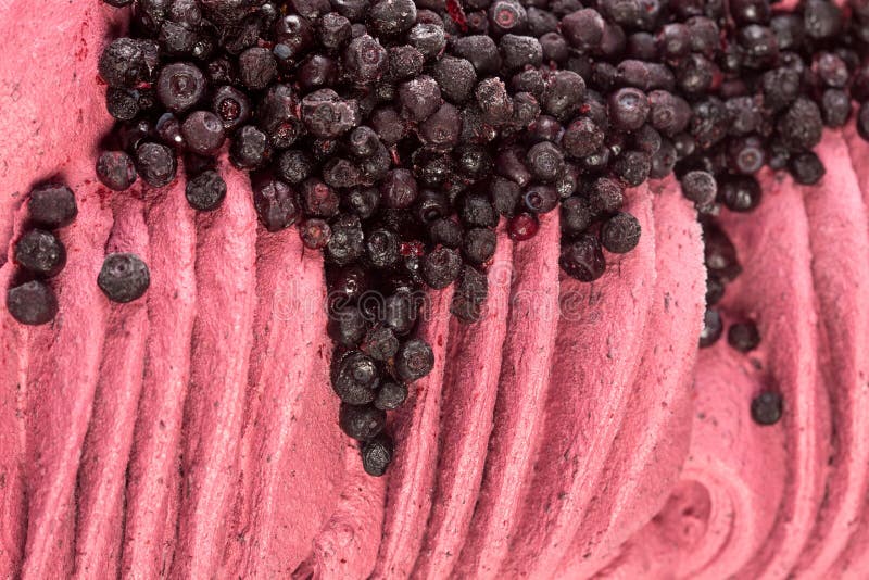 Texture of creamy ice-cream with blueberries close-up.