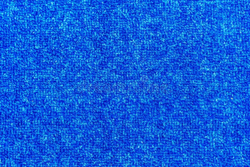 Texture d'un tapis bleu avec le tissage dense images stock Texture d'un tapis bleu avec le tissage dense images stock