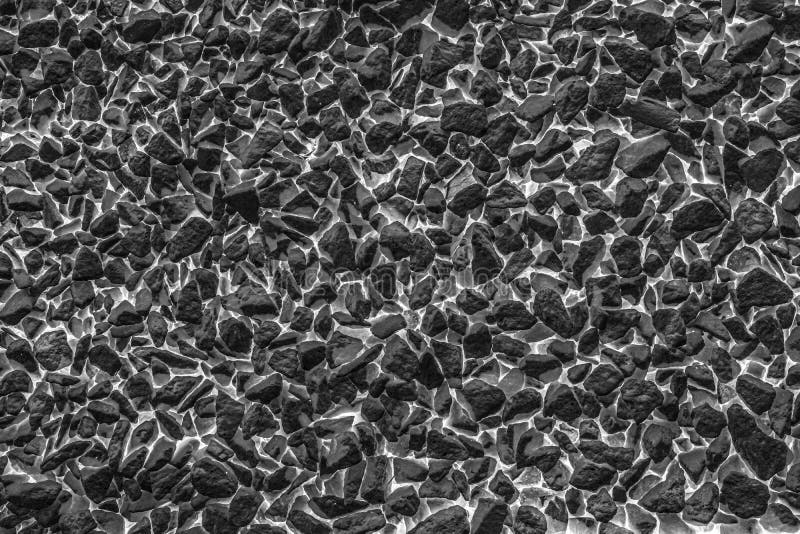 Texture de la paroi noire petits galets images stock Texture de la paroi noire petits galets images stock