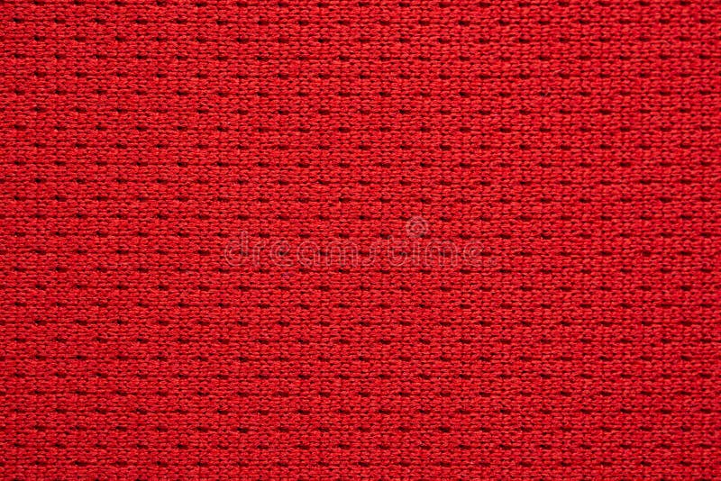 Texture de maillot de football en tissu de sport rouge