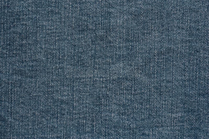 Texture du denim indigo usé. Texture ancienne de couleur indigo denim usé pour fond ou fond d'écran