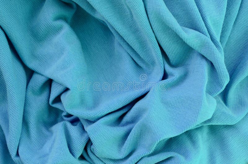 The Texture of the Fabric in Blue Color. Material for Making Shirts and