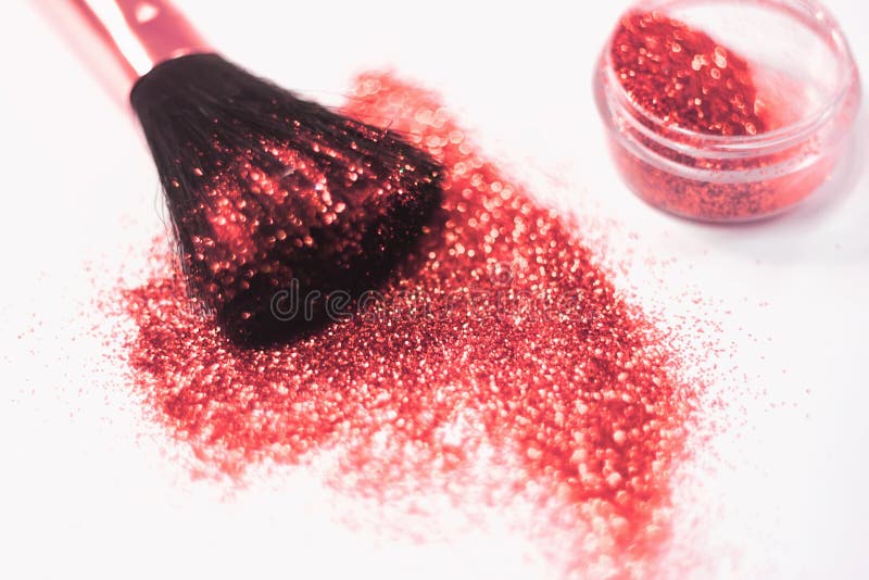 Texture of Gold Glitter on the Makeup Brush and Design. on White