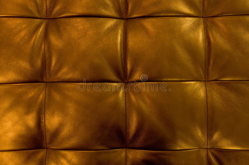 Texture of Golden Upholstery Leather Pattern Background Stock Image