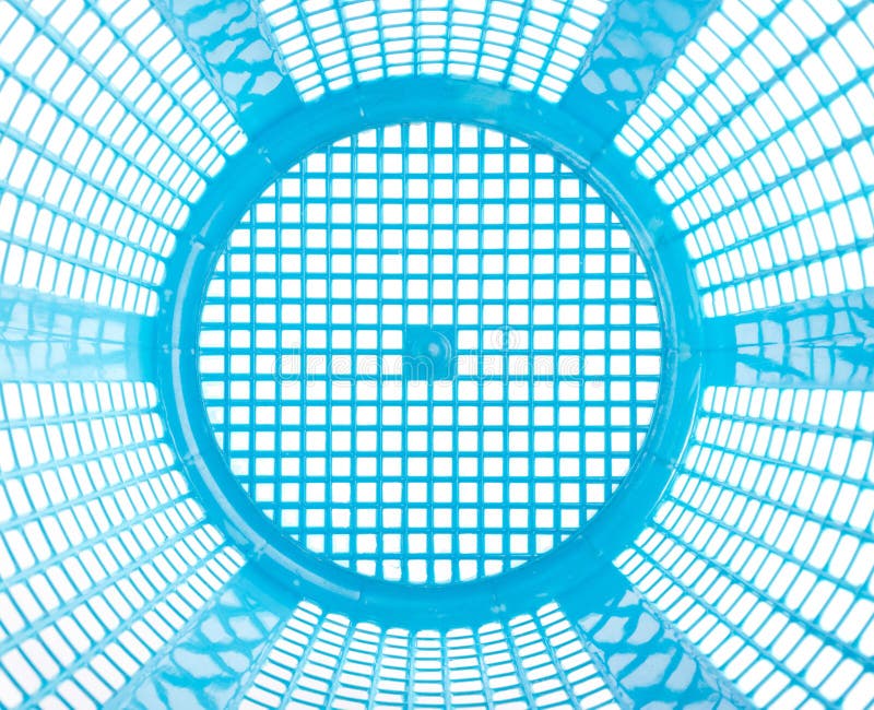 Texture inside of empty blue plastic basket isolated on white royalty free stock image