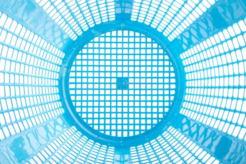 Texture inside of empty blue plastic basket isolated on white stock photography