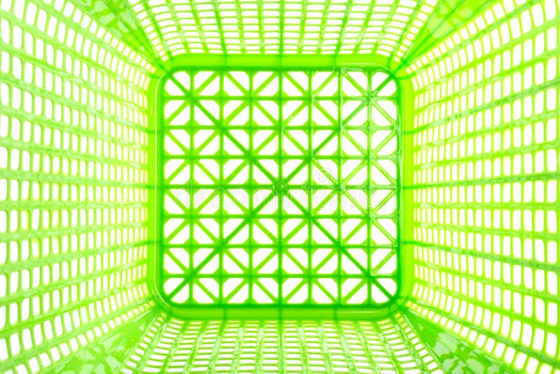 Texture inside of empty green plastic basket isolated on white royalty free stock image