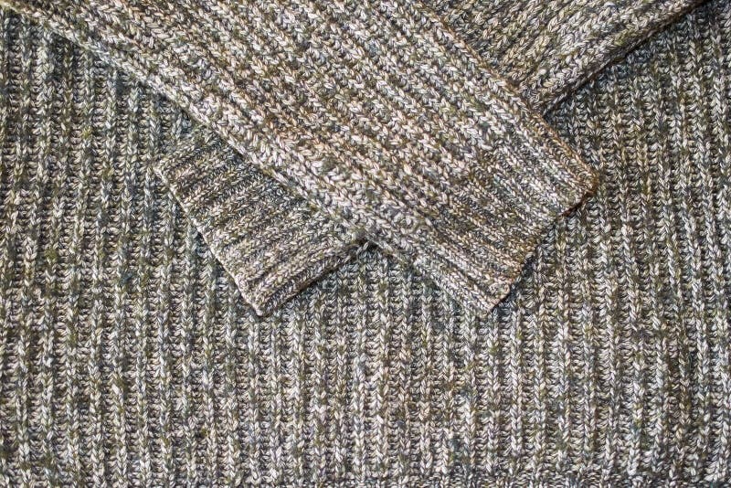 Texture of Knitted Wool Sweater with Sleeves Closeup, Horizontal