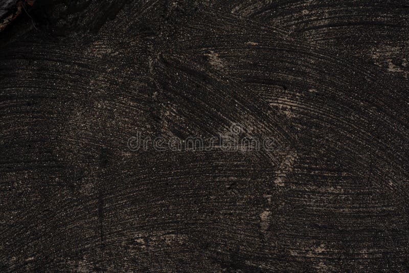 The Texture Layer of Plaster, Painted with Poor Quality Black Paint