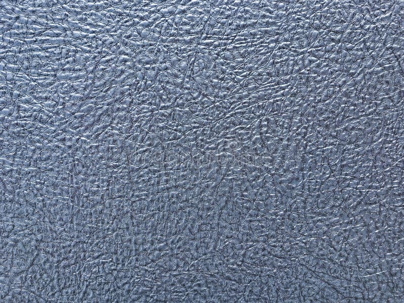 Texture of blue wallpaper with a pattern. Silver paper surface, structure closeup royalty free stock photo