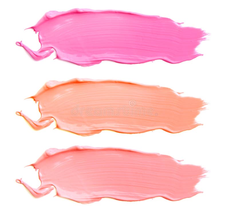 Texture of the lipstick of different colors isolated on white background. Set of multicolored strokes. Cosmetic product.