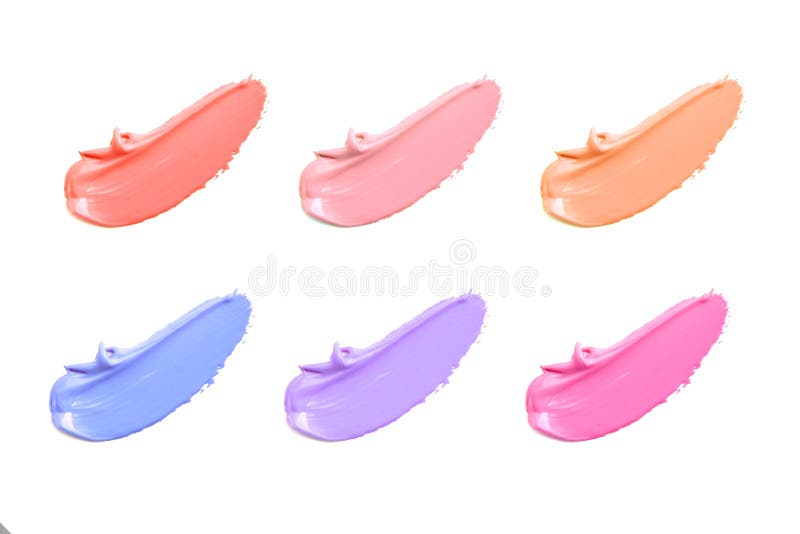 Texture of the lipstick of different colors isolated on white background. Set of multicolored strokes. Cosmetic product.