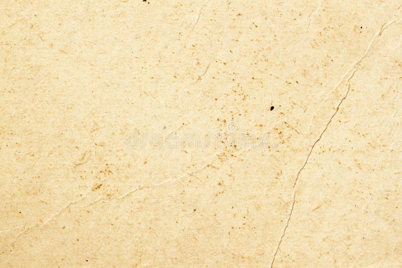 Texture of old organic light cream paper with wrinkles, background for design with copy space text or image. Recyclable royalty free stock images