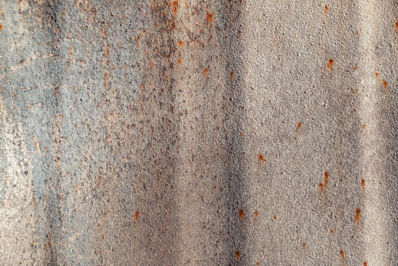 Old paint on rusty wall stock photo. Image of uneven 144689098
