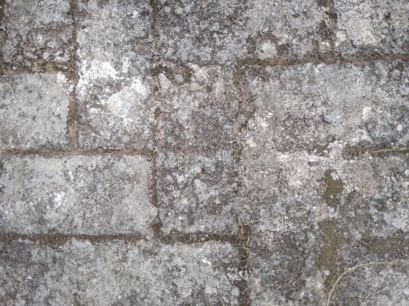 Texture of Paving Blocks that Have Long Been Laid Down Stock Photo