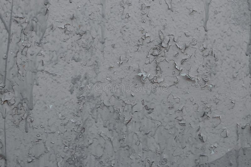Texture of Peeling Gray Paint. Gray Cracked Paint on the Wall