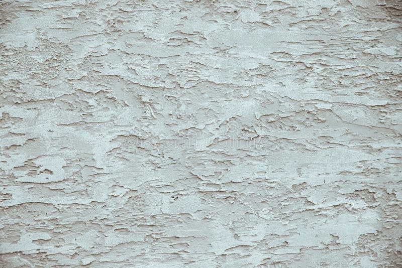 The Texture of the Plaster on the Wall. Uneven and Rough Surface of