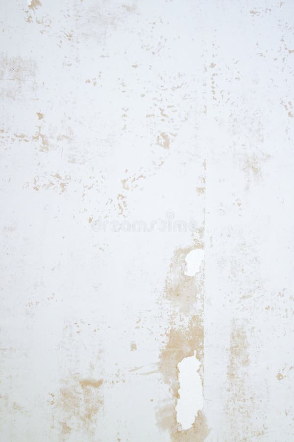 Texture plâtrée de mur avec des flocons de peinture et de remplisseur Surface poncée avec des imperfections images stock Texture plâtrée de mur avec des flocons de peinture et de remplisseur Surface poncée avec des imperfections images stock