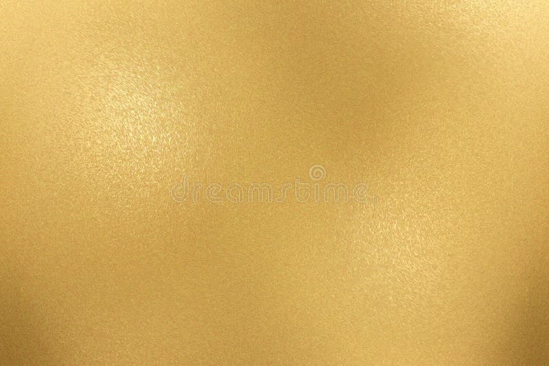 Texture of rough gold metallic sheet, abstract background royalty free stock photos