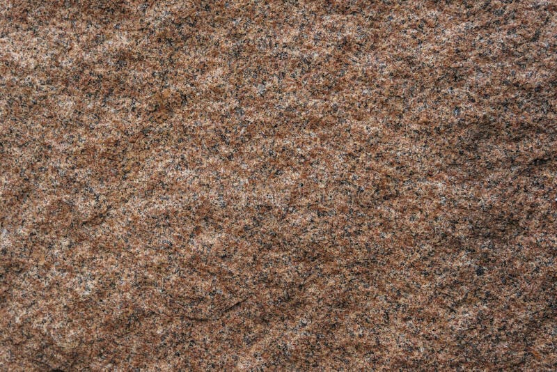 The texture of rough surface of red granite Close-up royalty free stock image The texture of rough surface of red granite Close-up royalty free stock image