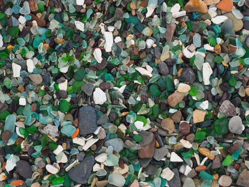 Pieces of Colored Glass on a Grey Rock Stock Image Image of glass