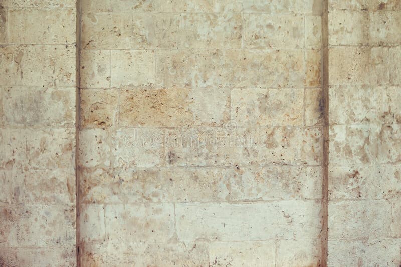 The texture of the stone walls, limestone blocks with frame, copy space stock image