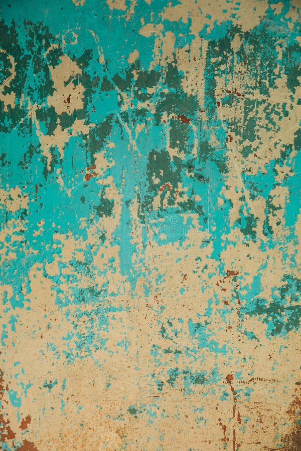 Texture on the wall with blue paint that peels off stock photography