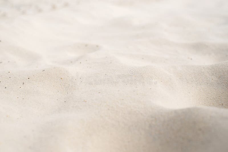 The texture of white sand in perspective.