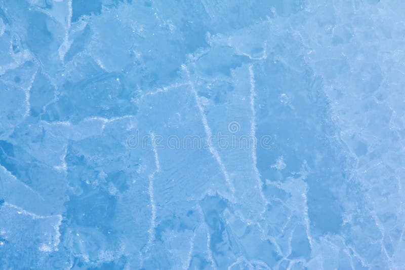 Texture of Winter Ice Surface. Blue Natural Ice Background Stock Photo