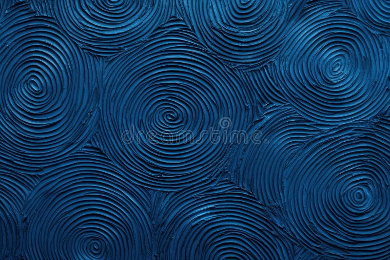 A textured blue background featuring swirling circular patterns royalty free illustration