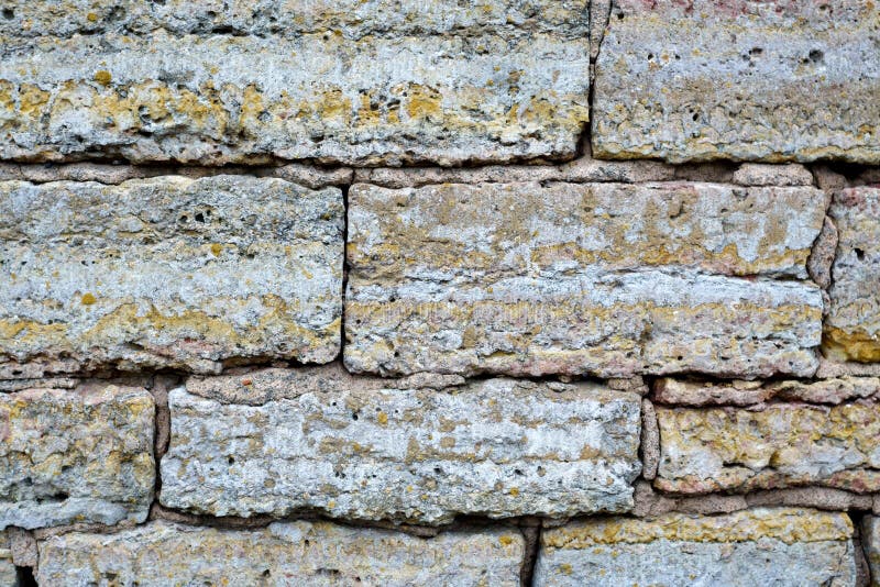 Grey Brick Wall with Cement Texture.