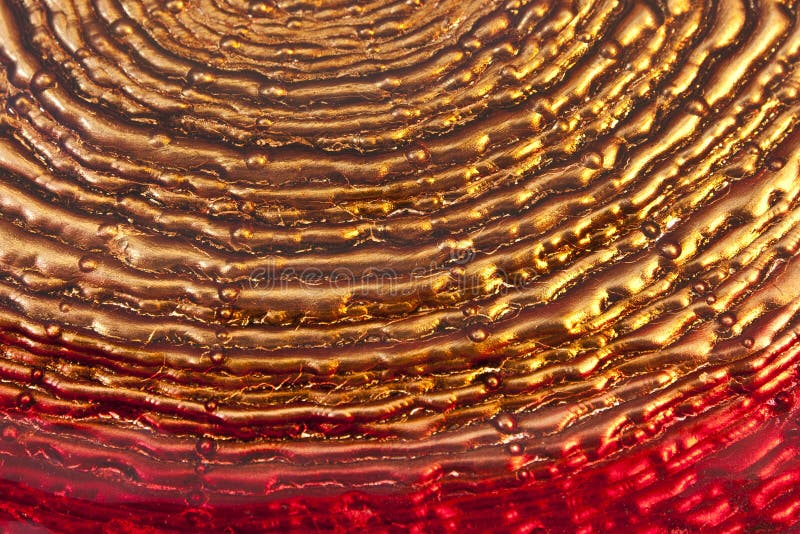 Textured golden and red glass background