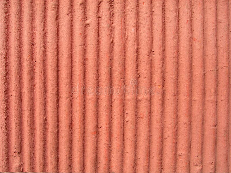 Textured orange plaster wall royalty free stock photo