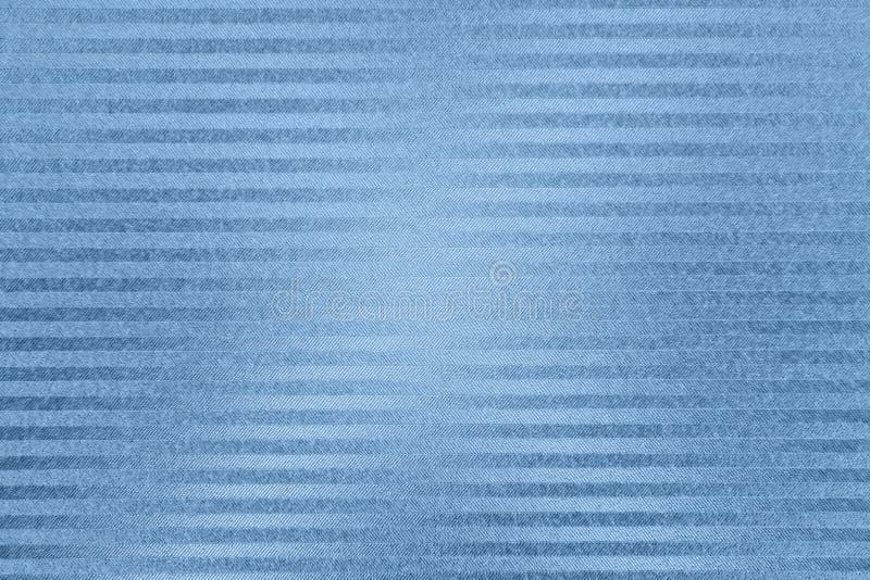 Textured paper background with blue surface effects