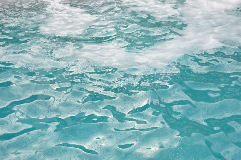 Textured Water Surface with Waves and Foam, Clear Blue Pool Water Stock Photo Image of glare