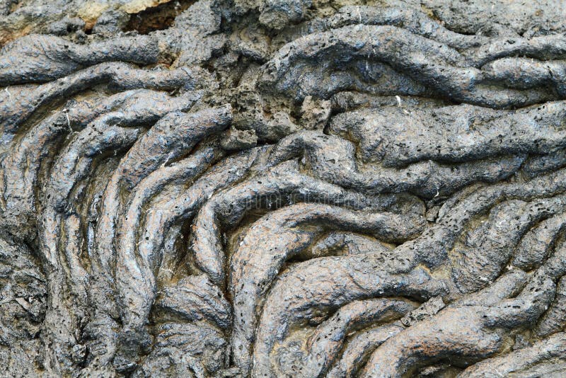 Texturer av svart lava (pahoehoe) i Santiagoön arkivfoton Texturer av svart lava (pahoehoe) i Santiagoön arkivfoton