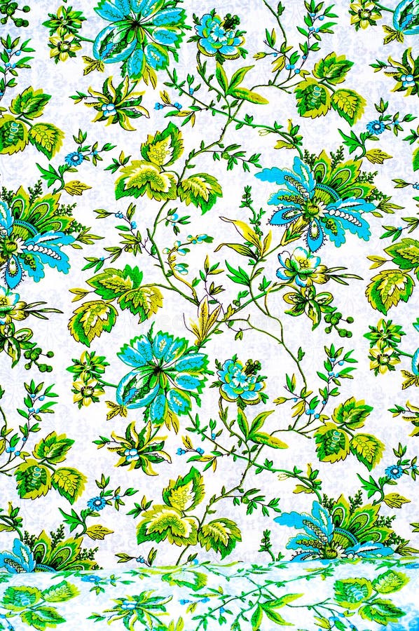 Texturera bakgrund textilar Bomullstorkduk linnar passande blommor. Texturera bakgrund textilar Bomullstorkduk linnar blommamodell på en beige bakgrund som drar på tyg