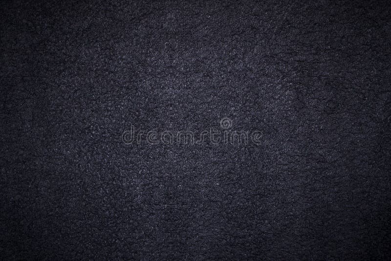 A black textured background design. A black textured background design.