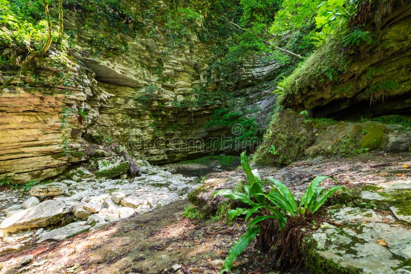 Textures of Various Stone Layers at Wall on Hiking Trail Stock Photo