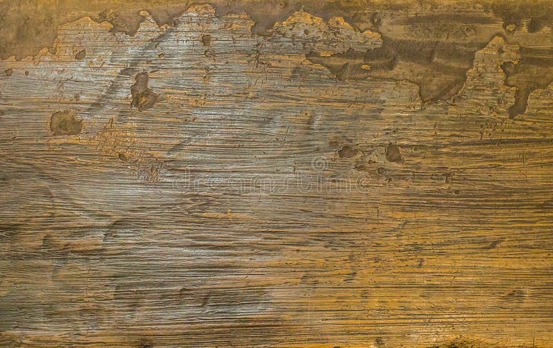 Texturice la vieja superficie de madera del fondo con la laca desigual del borde de la pátina