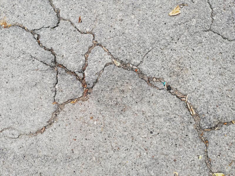 Textuur van gebarsten asfalt royalty-vrije stock afbeelding
