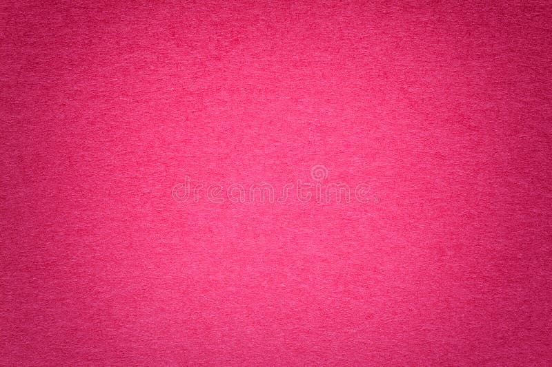 Texture of vintage dark purple paper background with vignette. Structure of dense magenta kraft cardboard with frame. Felt gradient backdrop closeup. Texture of vintage dark purple paper background with vignette. Structure of dense magenta kraft cardboard with frame. Felt gradient backdrop closeup