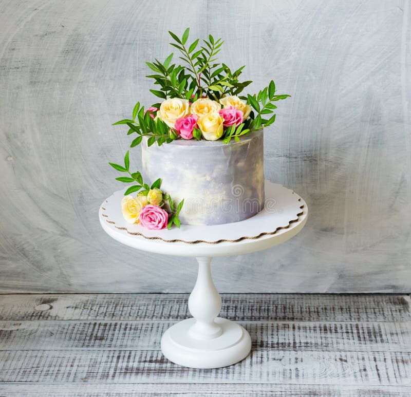 30th anniversary cake with roses on cake stand