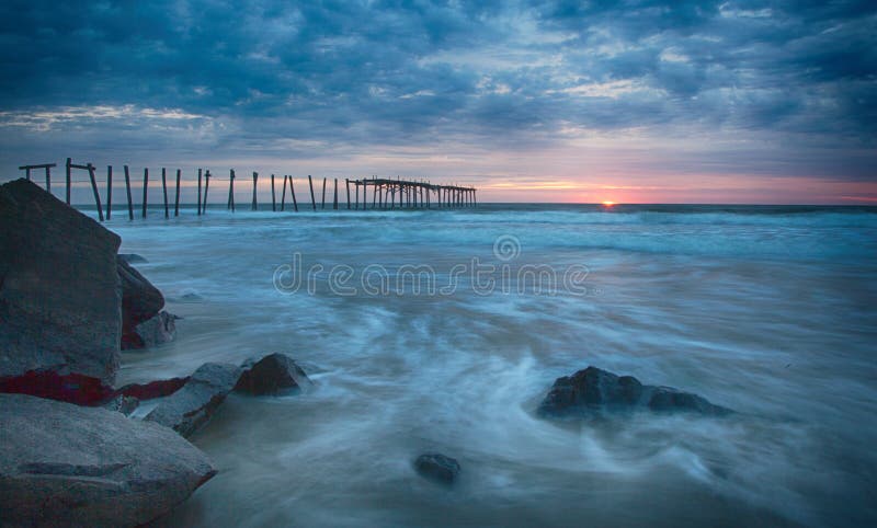 59th street Pier in Ocean City NJ. 59th st pier in ocean city nj before hurricane Sandy destroyed it. Photographed at sunrise, with lots of clouds stock images 59th street Pier in Ocean City NJ. 59th st pier in ocean city nj before hurricane Sandy destroyed it. Photographed at sunrise, with lots of clouds stock images