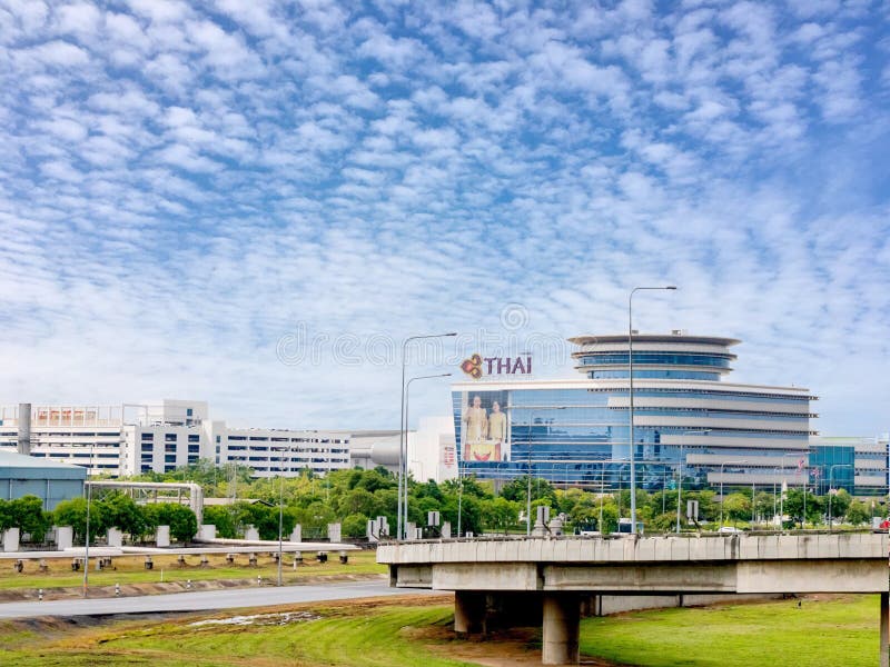 Thai airways operation centerOPC building at suvarnnabhumi airport with Thai king and queen poster at the wall. Bangkok, royalty free stock image Thai airways operation centerOPC building at suvarnnabhumi airport with Thai king and queen poster at the wall. Bangkok, royalty free stock image