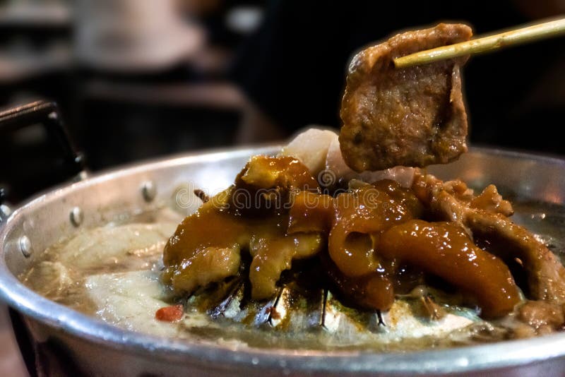 Thai Barbecue Buffet Style, Pig Pan, Grill Pork on Hot Pan Buffet Stock