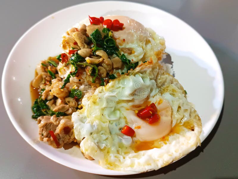 Thai Basil Stir Fried with Pork and Fried Eggs Stock Photo Image of
